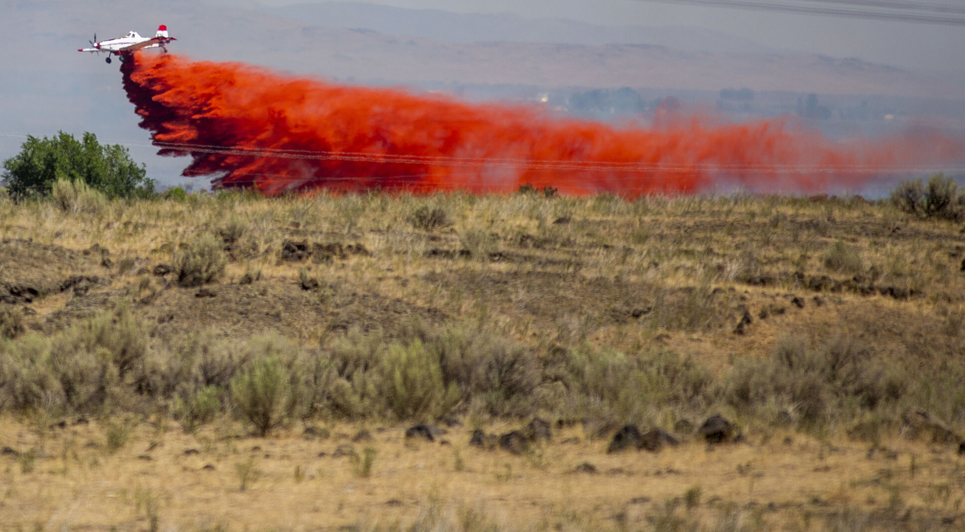 Drops Fire spreads more than 2,000 acres